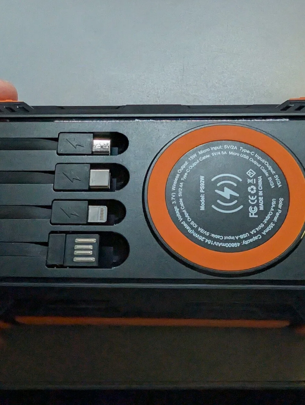 New/Sealed..42800mAh Rugged Portable Power Bank/Built-In Cables/ Wireless Pad